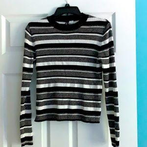 Has NOT been worn, size large fits like a medium!